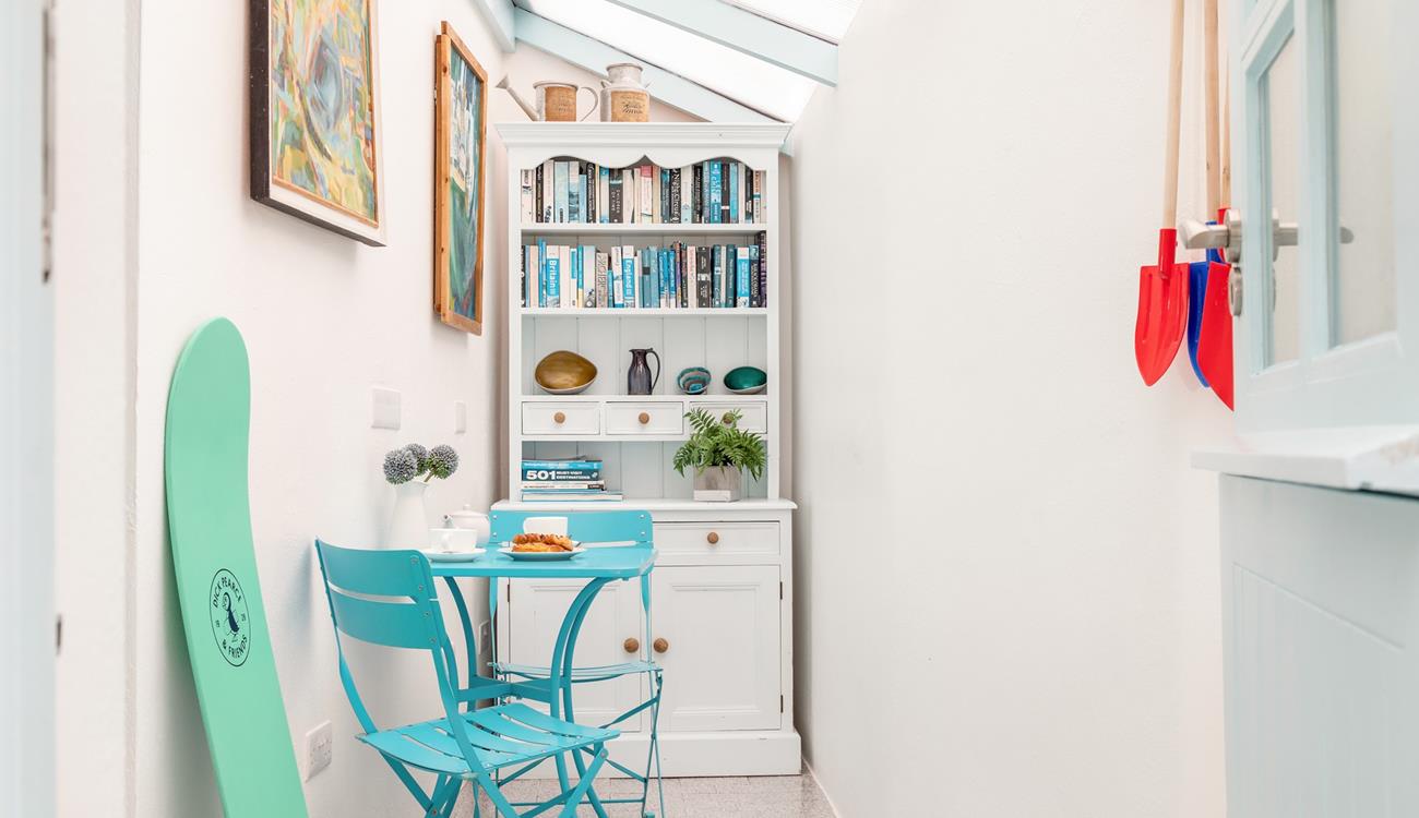 The porch area is an ideal space to store your buckets and spades!