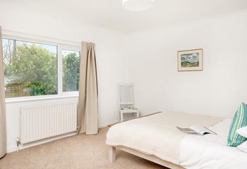 Bedroom 2 also has a cosy king size bed and is decorated in calming neutral tones.