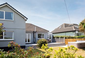 The large decking area is perfect for savouring a tasty barbecue under the Cornish sun.