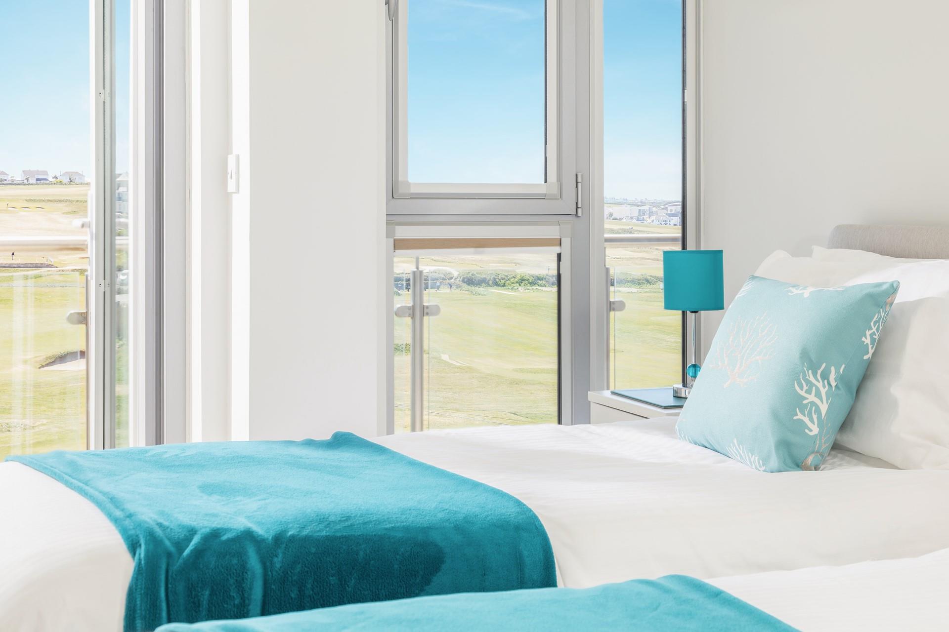 Lie in bed and listen to the sounds of the sea, with the windows open on a warm summer's morning.