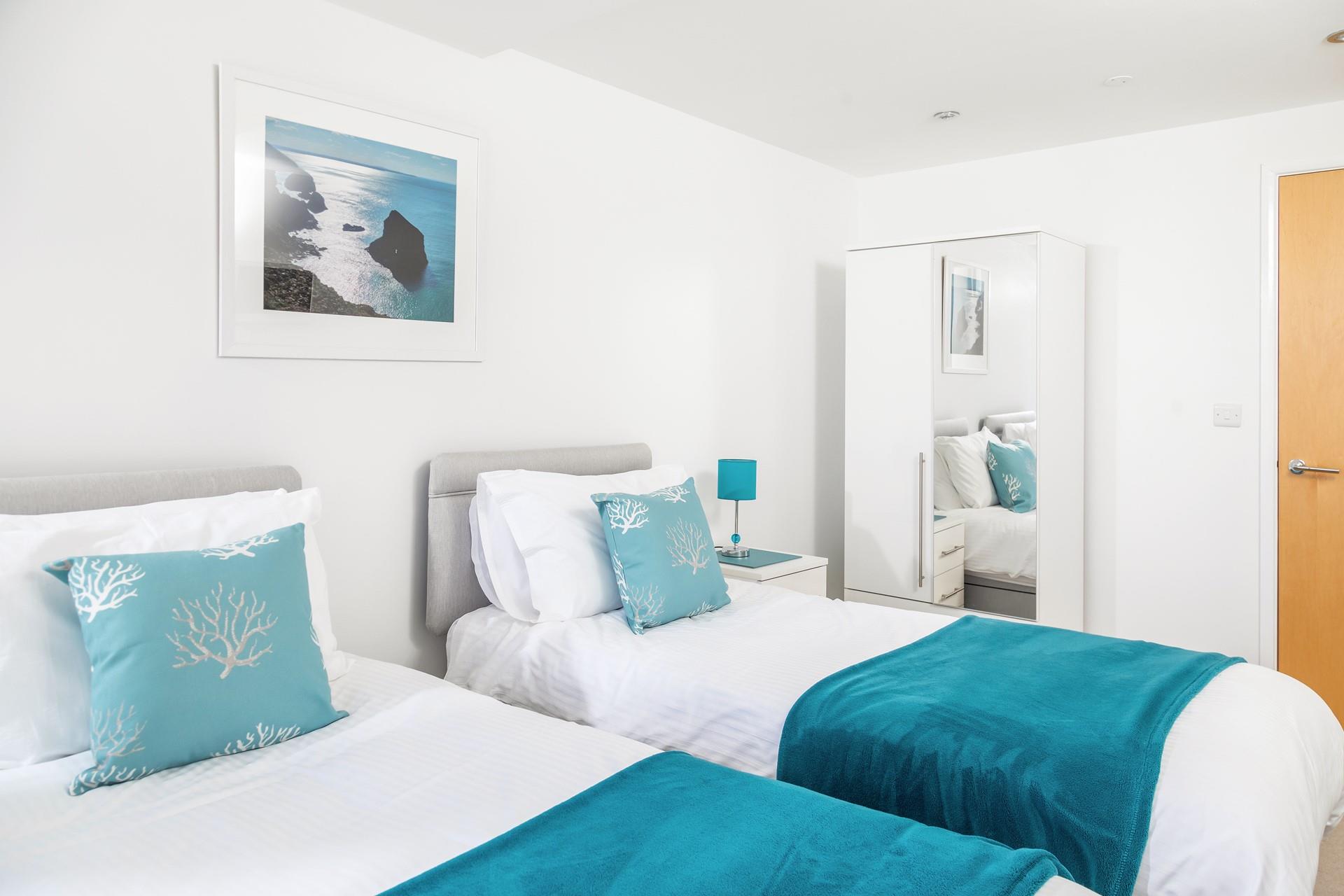 The décor is fresh and light, with storage for all your holiday best. 