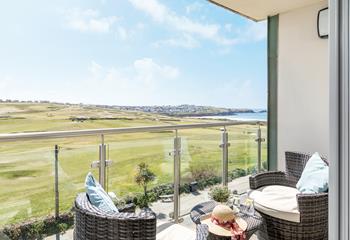 The balcony is a lovely suntrap for enjoying a summer's afternoon with a book and a cold drink.