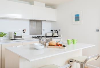 The kitchen area is light and airy, with everything you need for preparing an evening meal. 