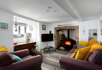 We love the feature fireplace, with granite surround, traditional wall oven and woodburner.