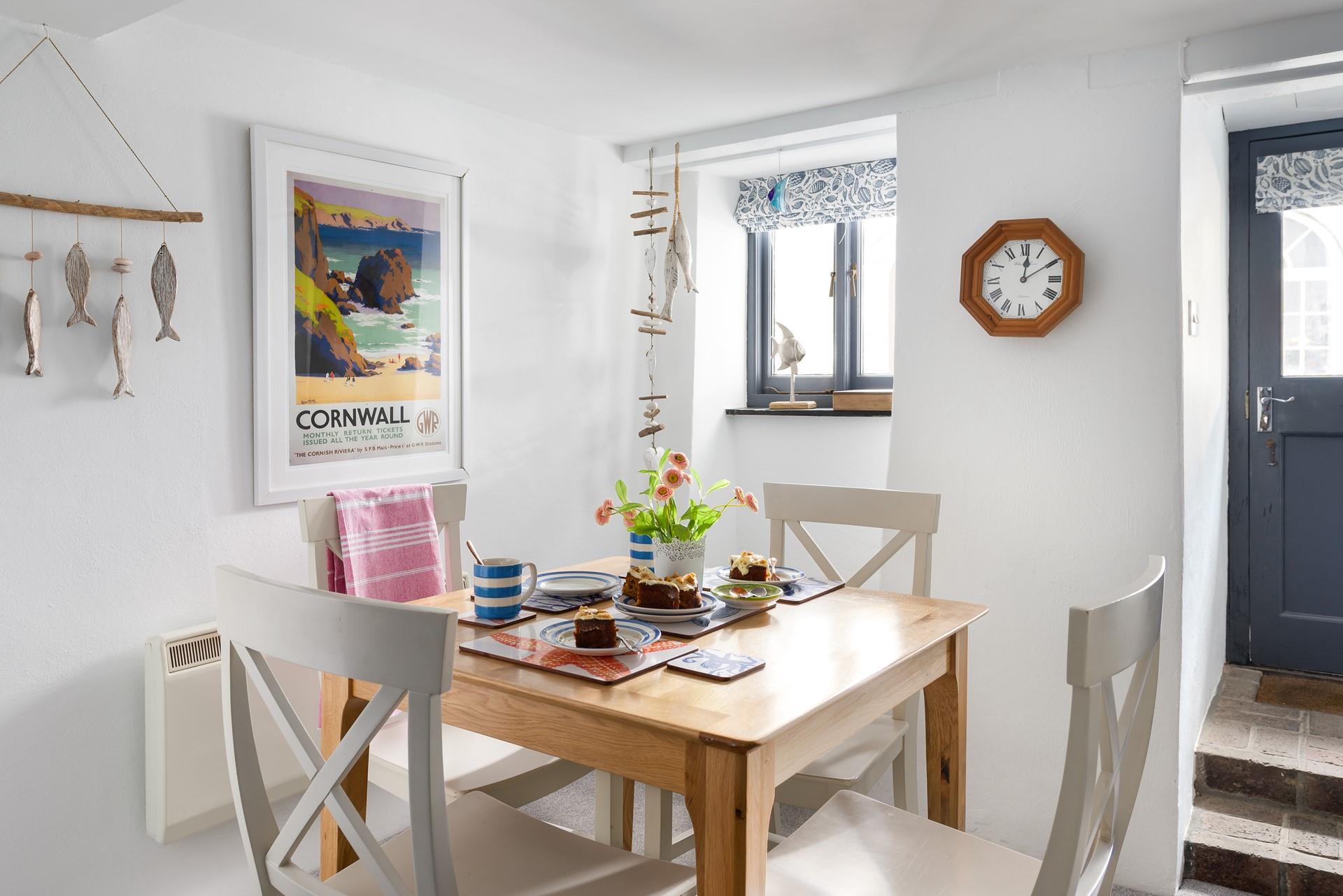 The dining area is bright and welcoming, perfect for an afternoon tea. 