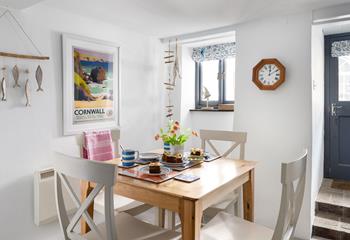 The dining area is bright and welcoming, perfect for an afternoon tea. 