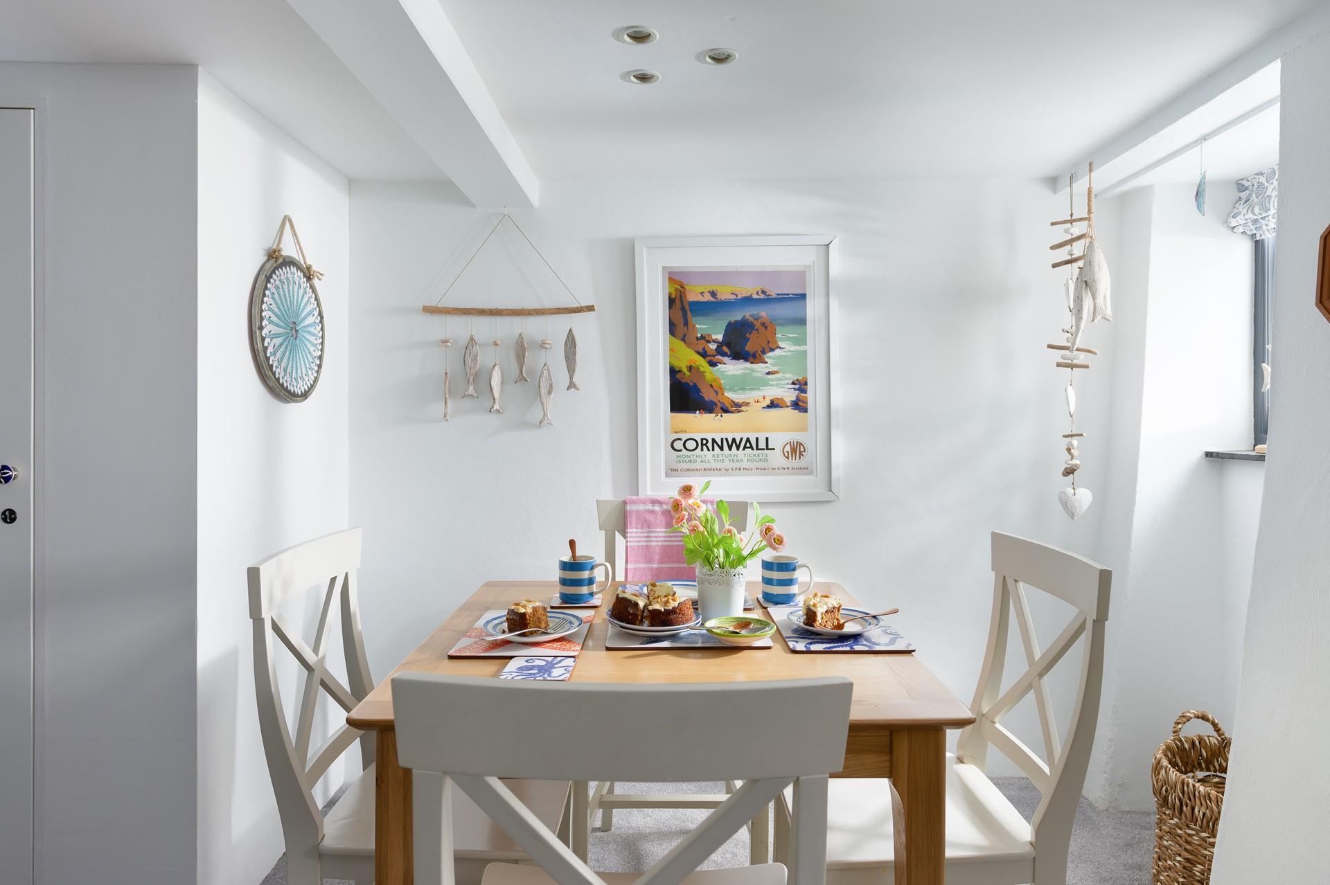 The pretty coastal décor reflects the property's proximity to the sea. 