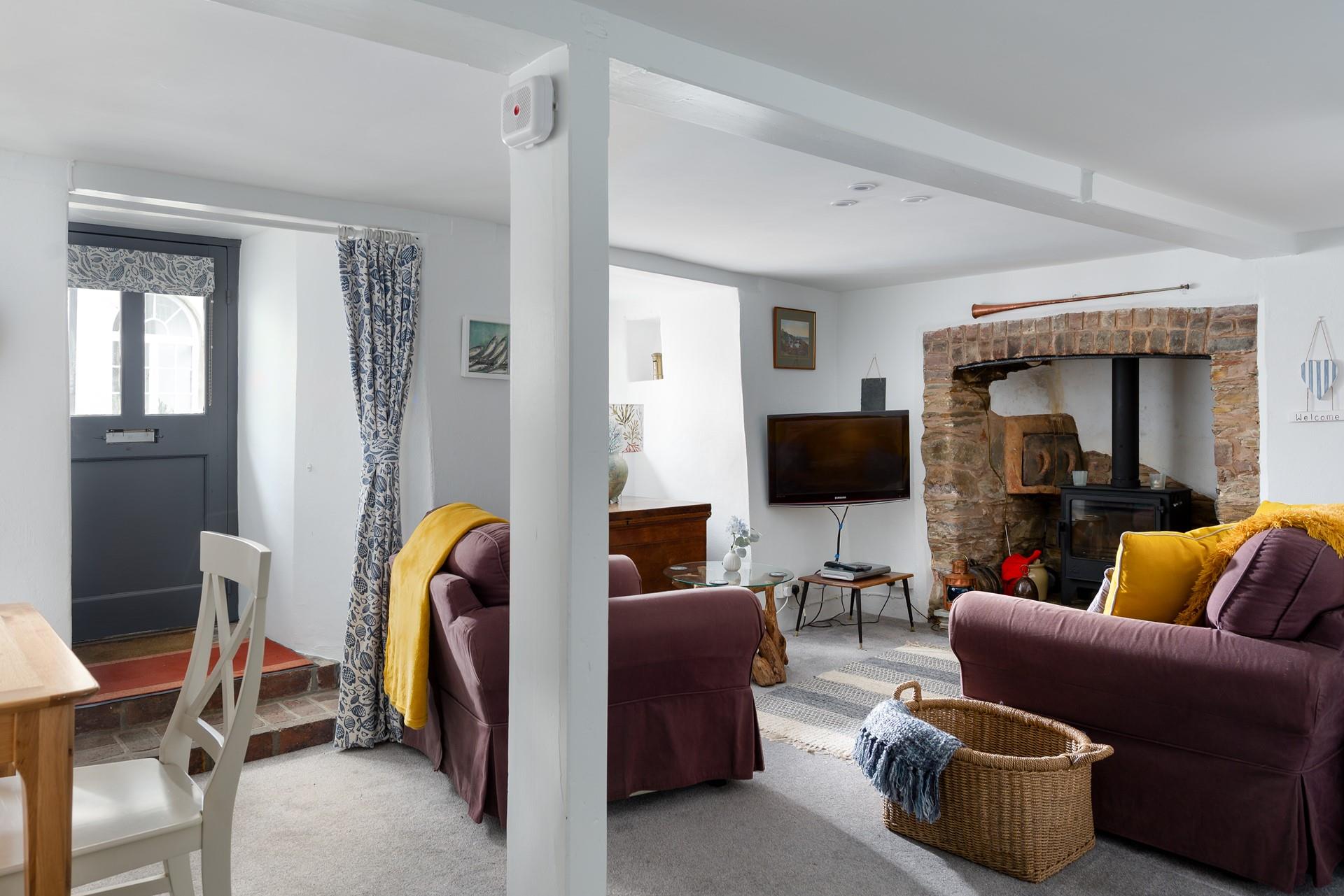 You'll feel at home at the quaint Post Box Cottage. 