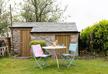 Enjoy a cup of tea and cake in the pretty garden. 