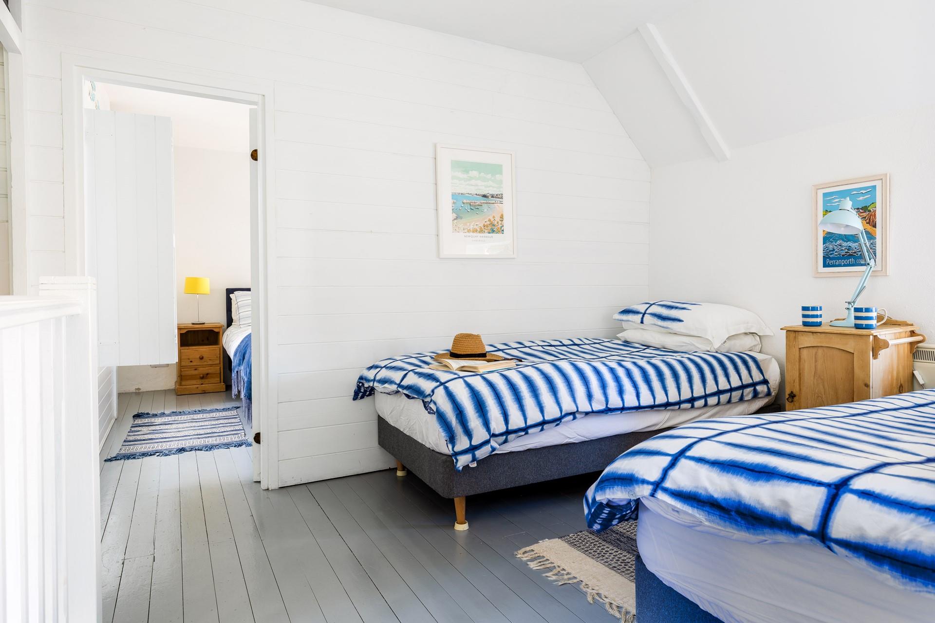 A connecting door leads from bedroom 1 into bedroom 2.