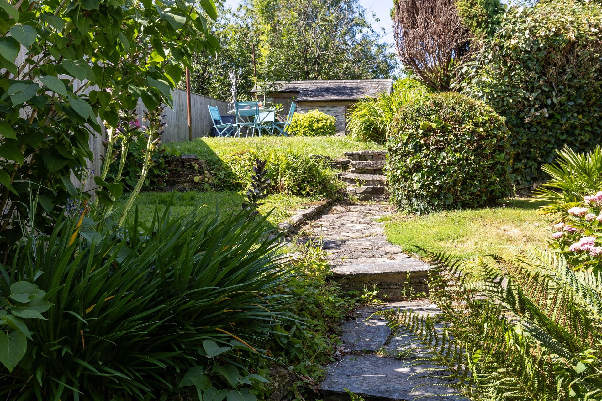The pretty garden is bursting with native flora.