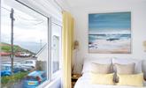 We love the contemporary seaside artwork above the bed! - Thumbnail Image