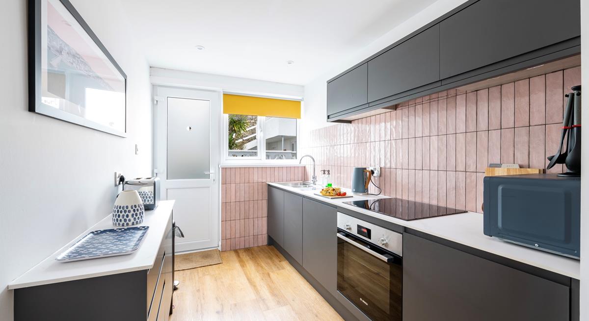 Fully-equipped with all you need, the kitchen is ideal for prepping food for the day. 