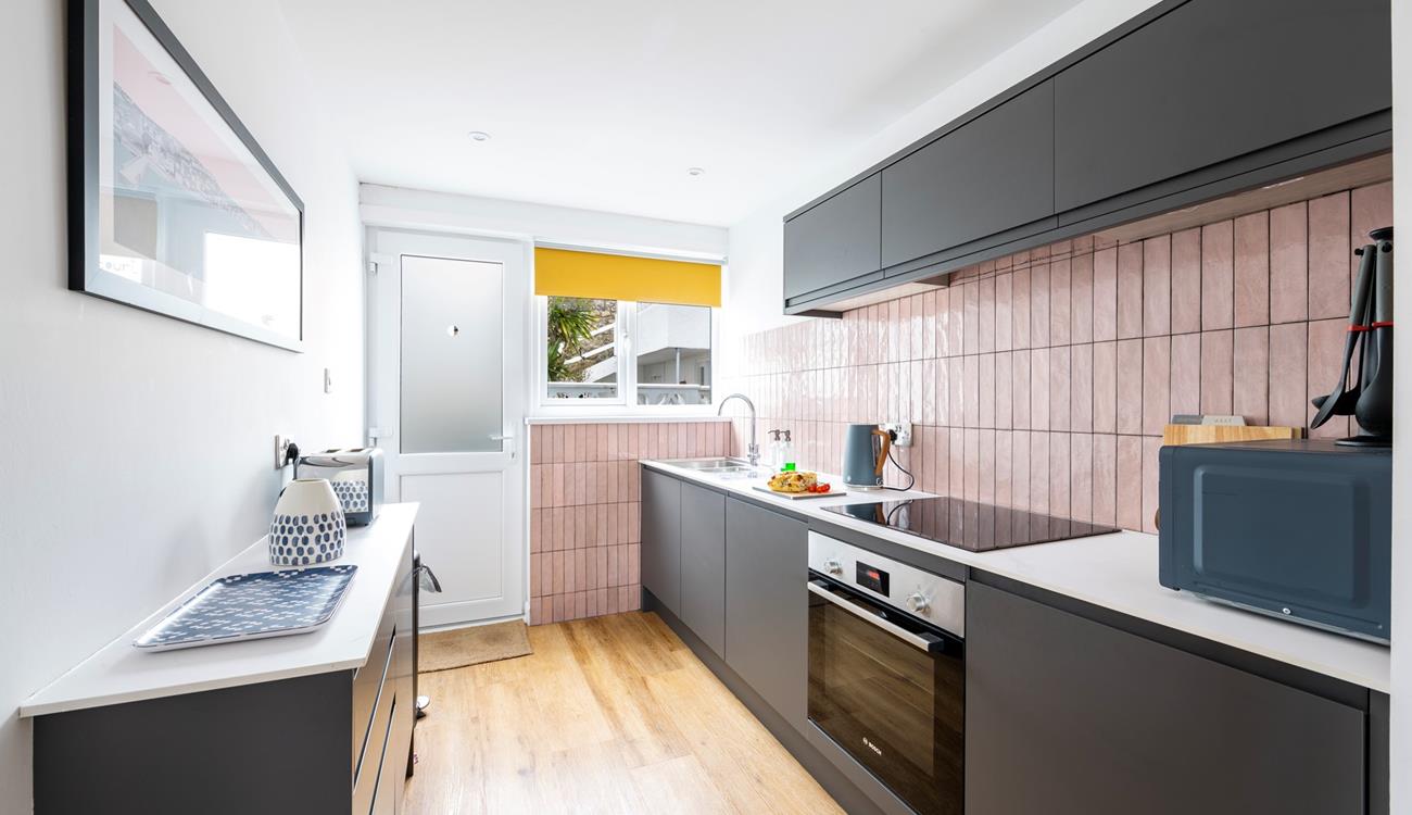 Fully-equipped with all you need, the kitchen is ideal for prepping food for the day. 