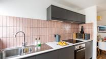 Sleek and stylish, you'll love cooking up a feast in the kitchen at No 5 Beach Court. 