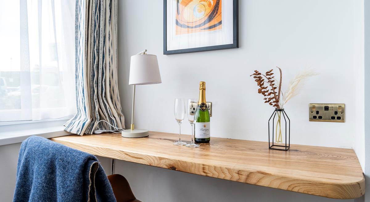 Catch up on emails or work at the convenient desk space.