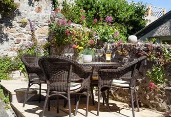 Relax with a glass of wine on the rear terrace, catching the last of those rays. 