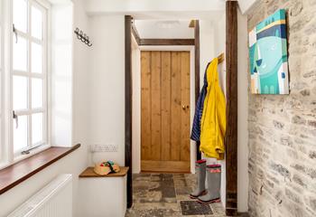 Utility entrance, ideal for depositing wet and muddy clothes before heading off to the ground floor shower and bedroom.