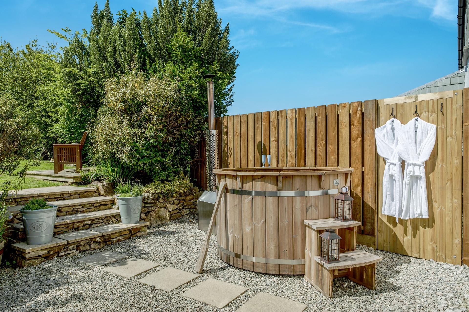 Chill out and relax in the hot tub situated in the enclosed private garden. 
