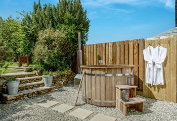 Chill out and relax in the hot tub situated in the enclosed private garden. 