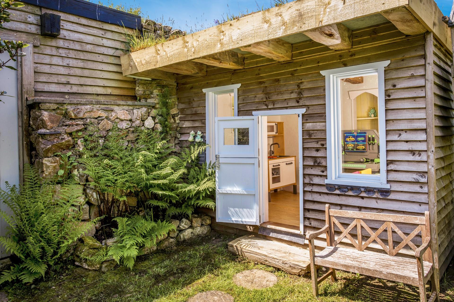 The kids will love to explore the playhouse!