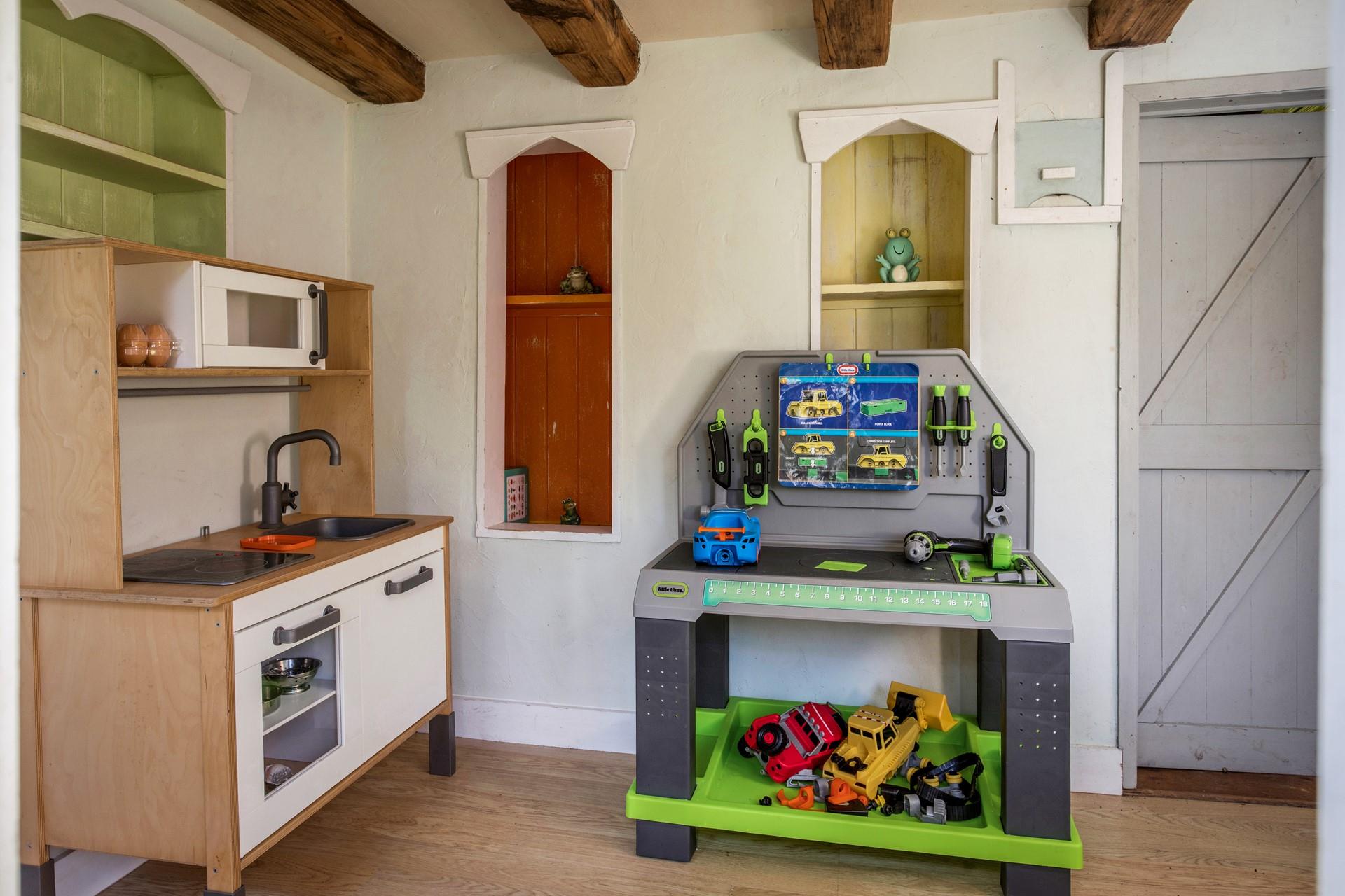 Children will amuse themselves for hours in the garden playhouse.