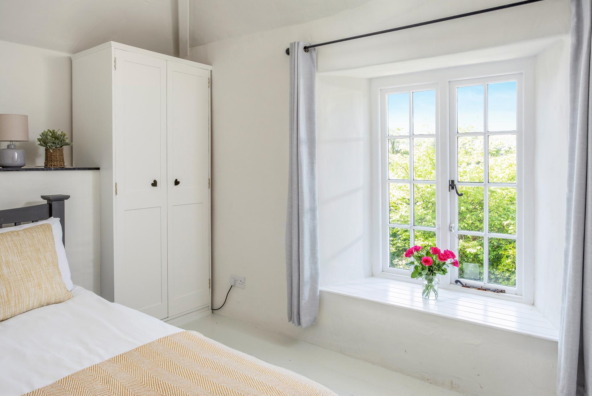 Enjoy the Scandinavian feel and the sun streaming through the window.