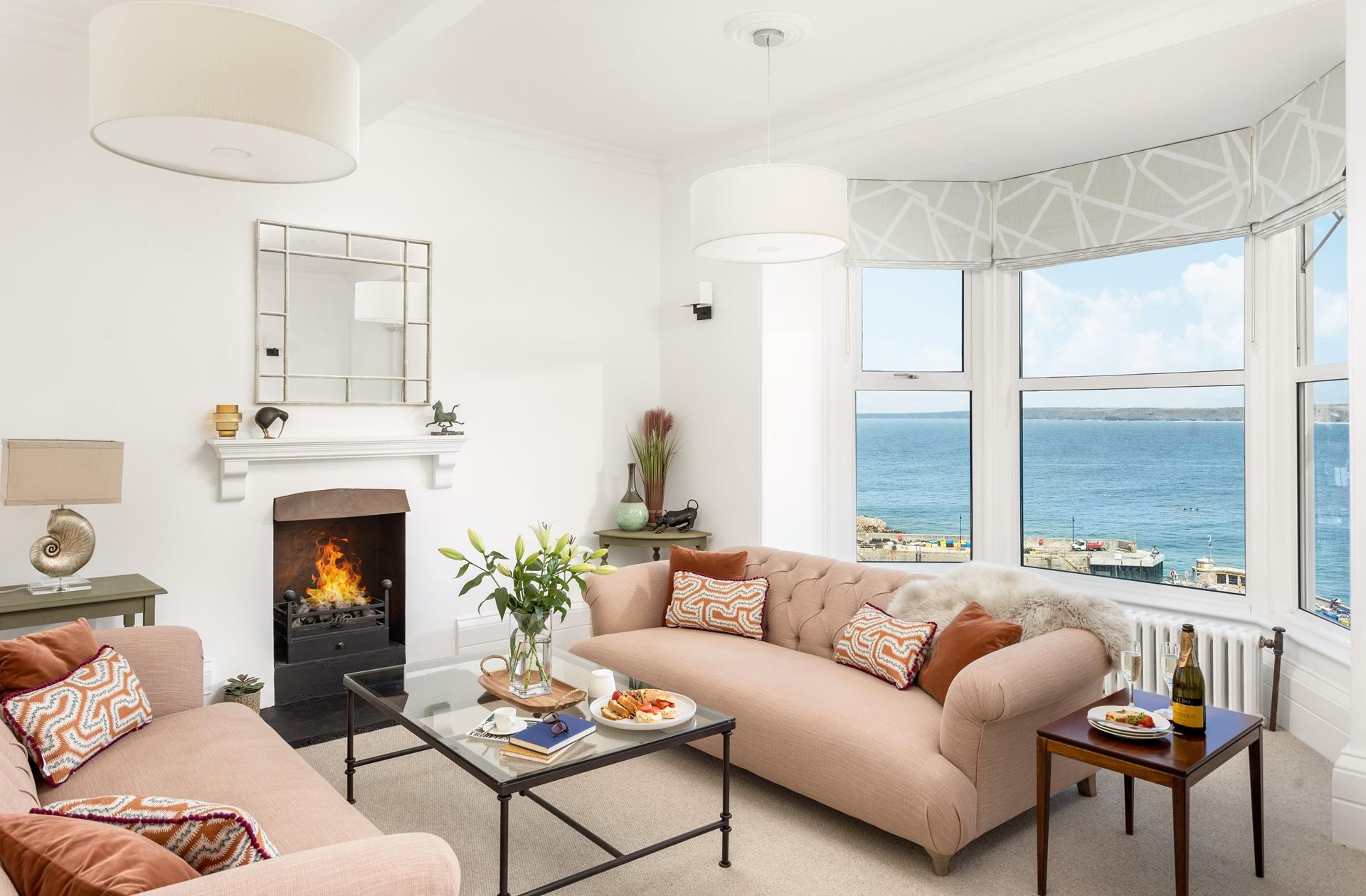 The palatial living room benefits from glorious views from the elevated position on the first floor. 