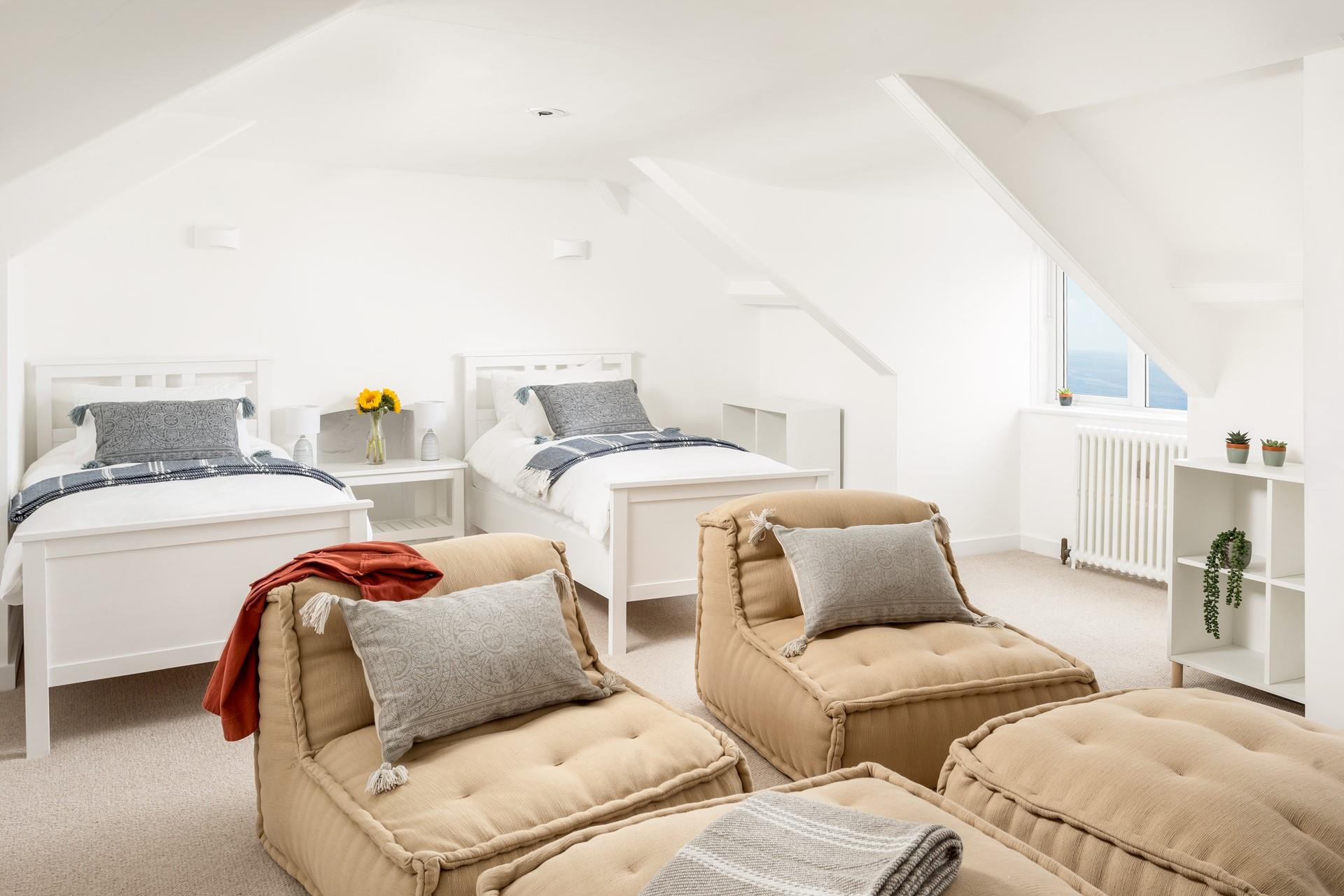 Bedroom 6 on the second floor is a teenager's dream! They can lay uninterrupted for hours on the lounge bean bags. 