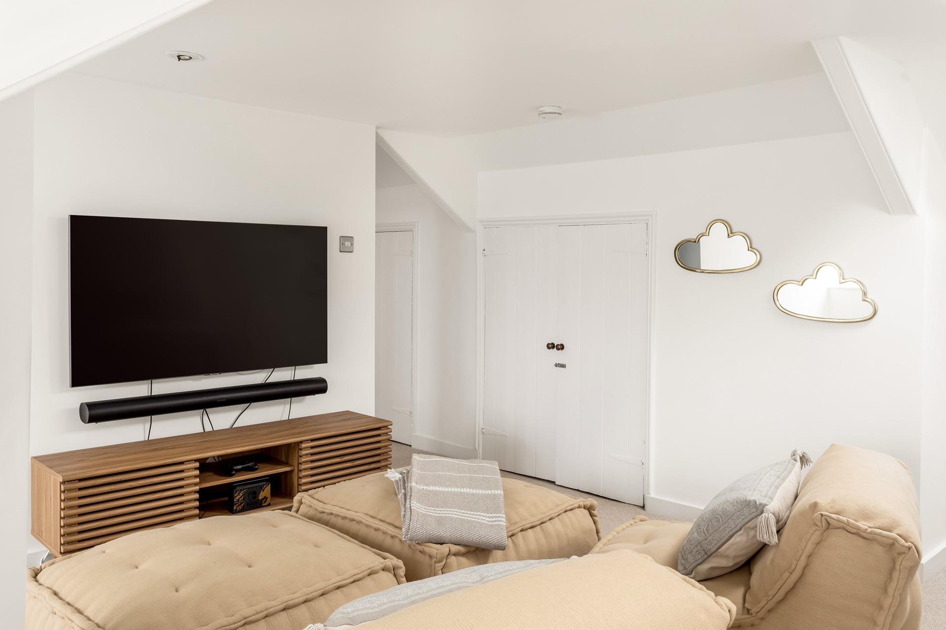 Relax on the bean bags in bedroom 6, whiling away a rainy day playing on the Nintendo Switch. 