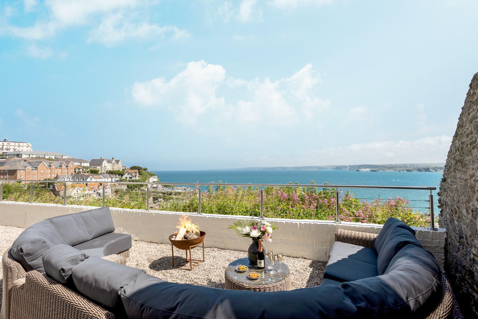 Kick back and relax on the garden furniture on the terrace, whilst the boats come back and forth from the working harbour.