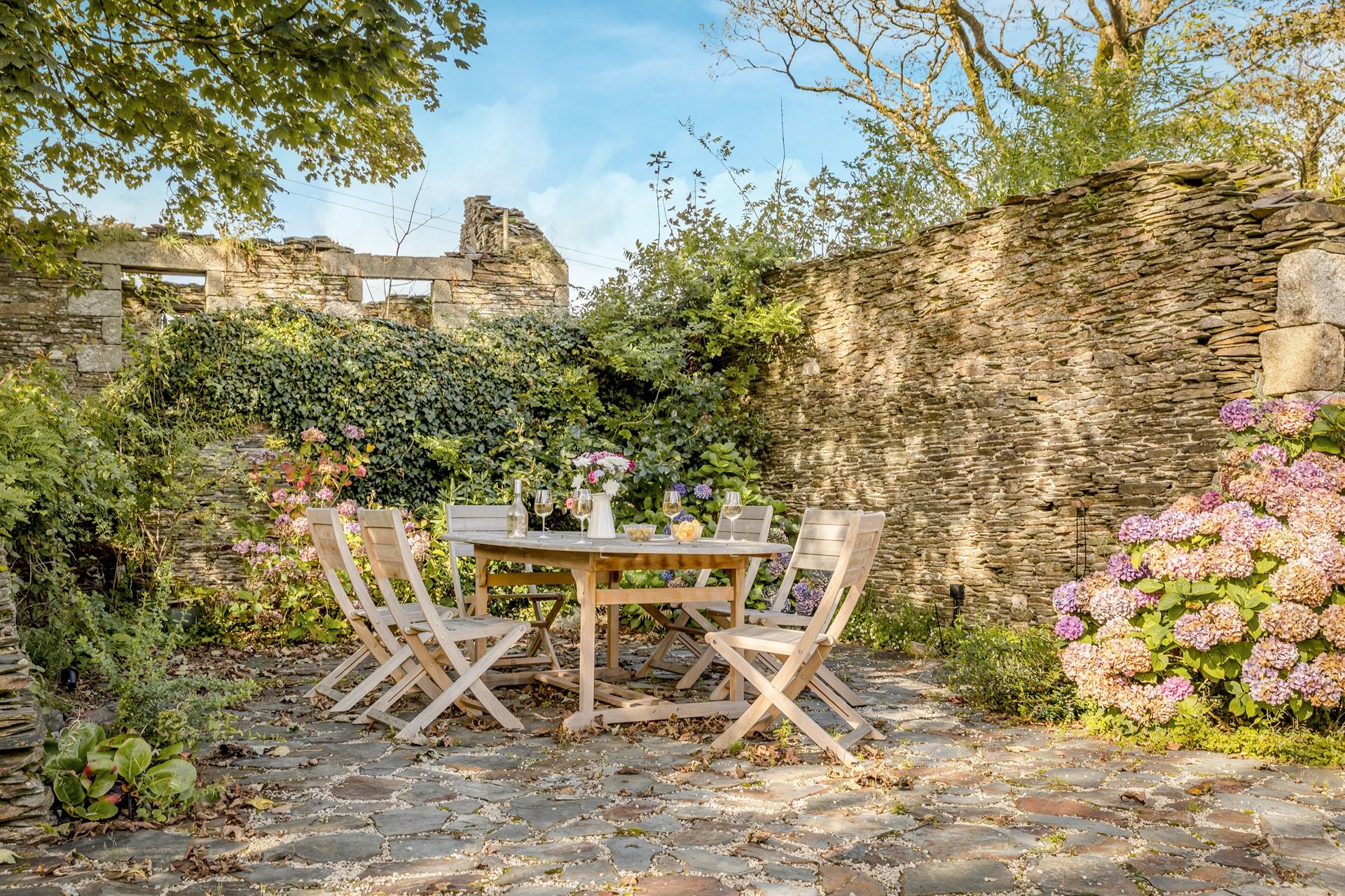 Enjoy long lazy lunches outside on the walled terrace.