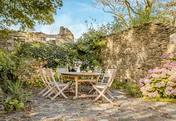 Enjoy long lazy lunches outside on the walled terrace.