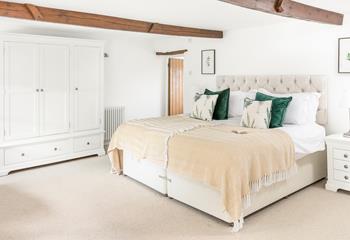 We love the countryside-inspired colours in bedroom 1.