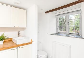 The utility room has an additional WC and basin.