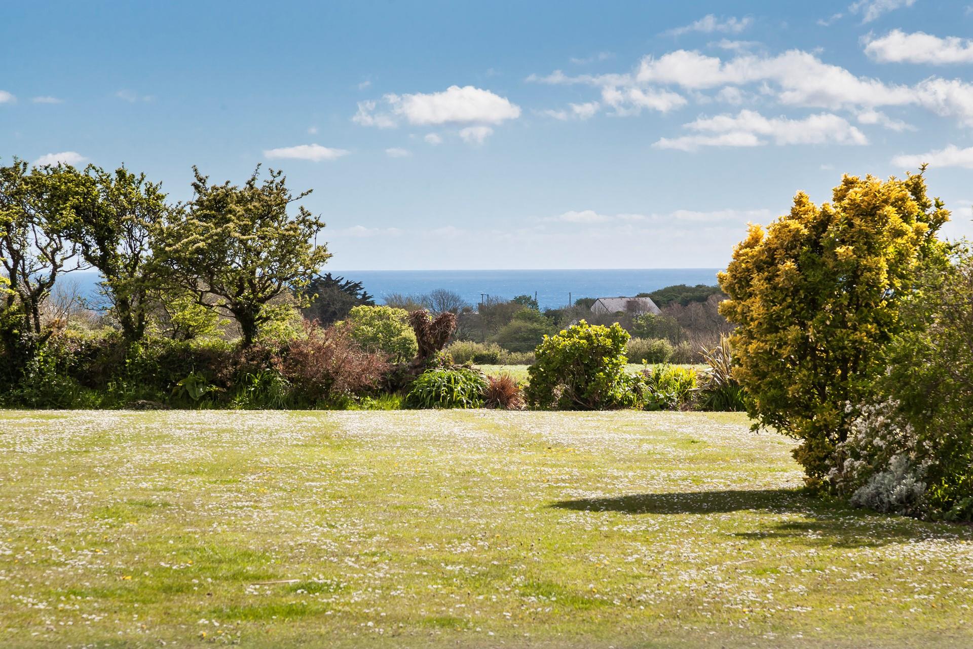 Enjoy stunning views across the fields and towards the sea. 