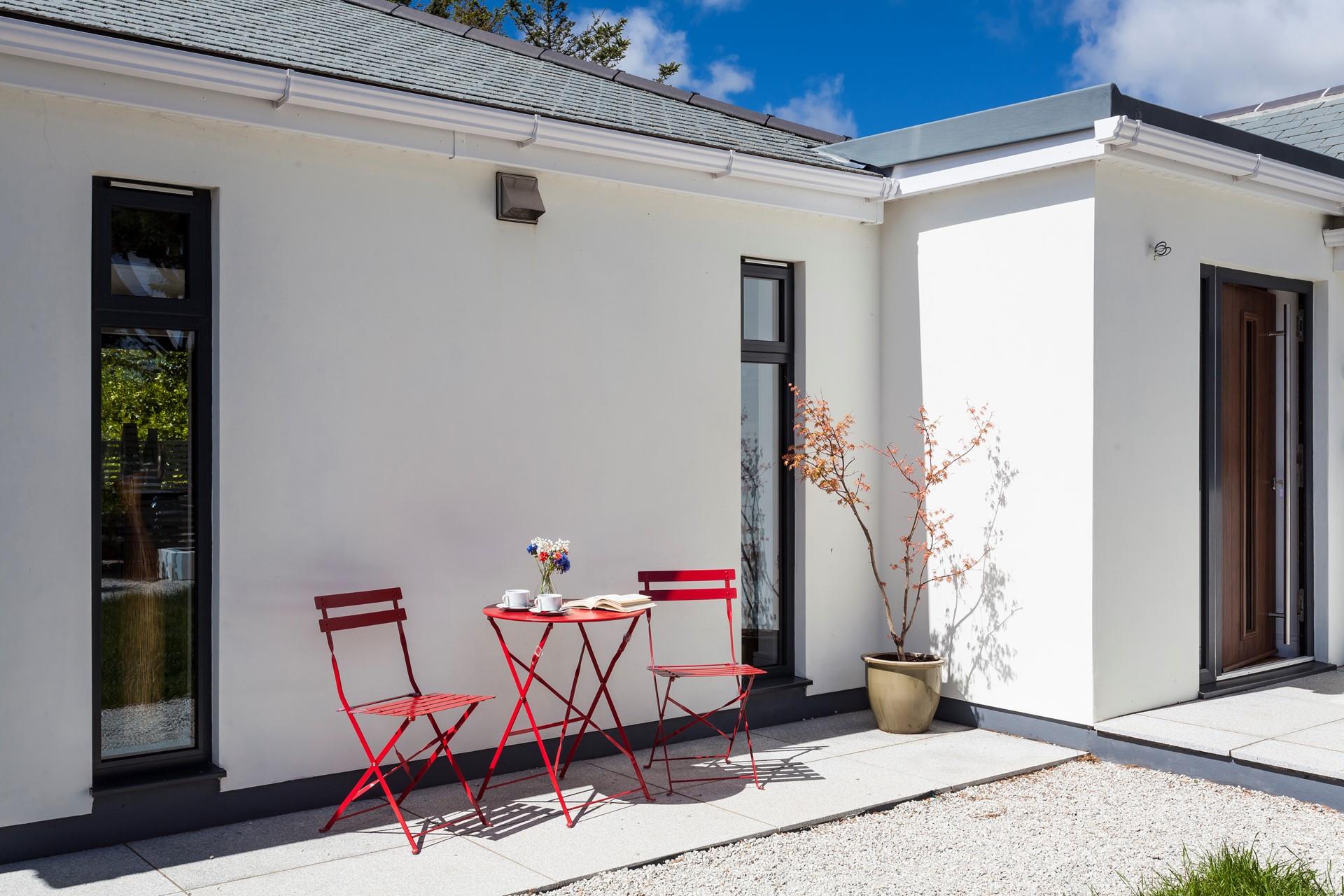Make the most of the morning sunshine at the bistro table and chairs. 