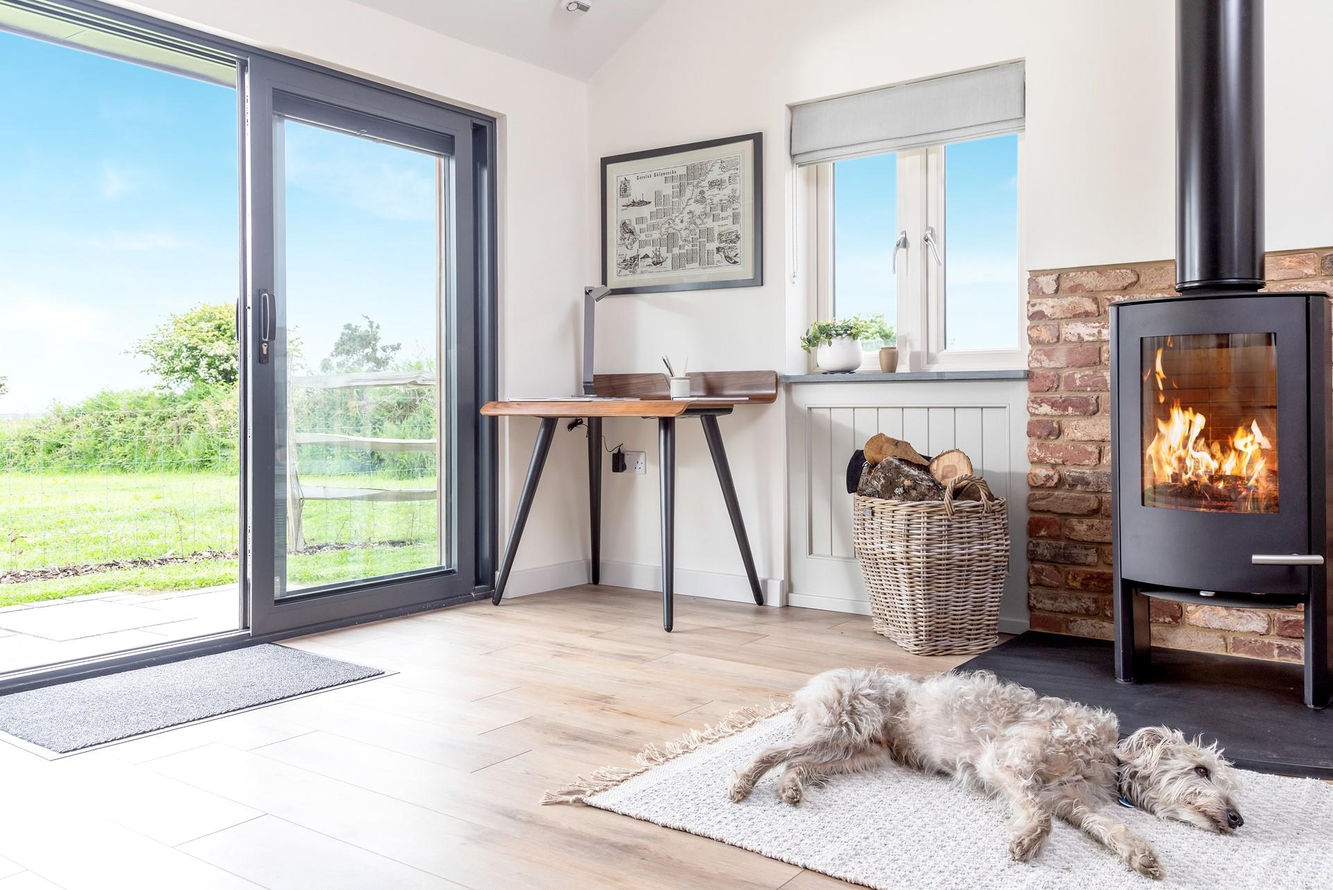 Your four-legged family members will love resting in front of the fire after running around the enclosed garden.
