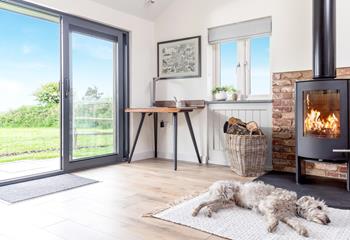 Your four-legged family members will love resting in front of the fire after running around the enclosed garden.