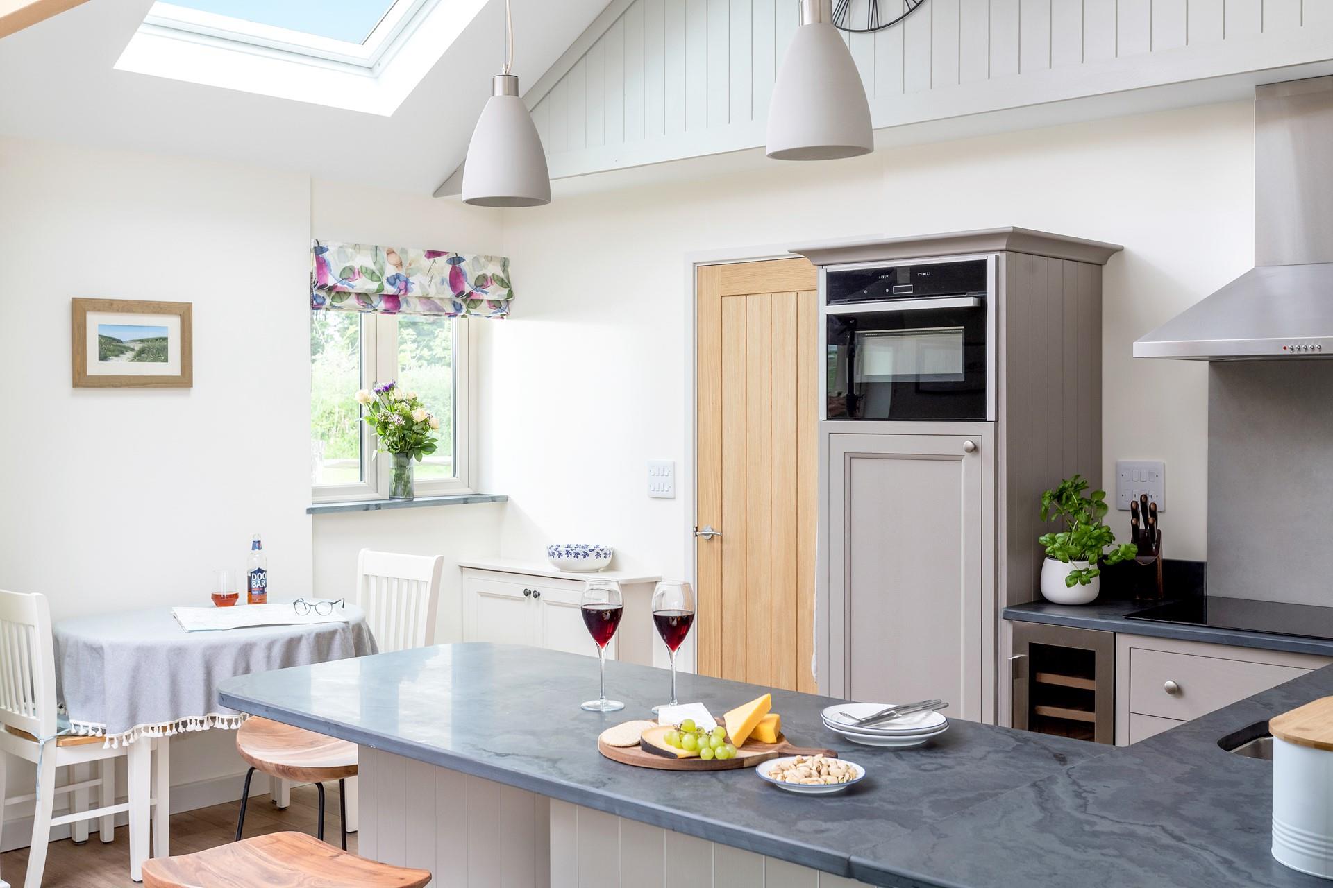 The light and airy kitchen is a delight to cook in!