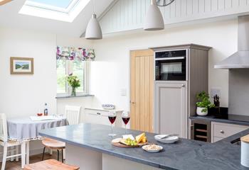 The light and airy kitchen is a delight to cook in!