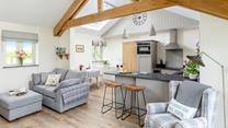The open plan living space means you can still entertain whilst cooking meals.