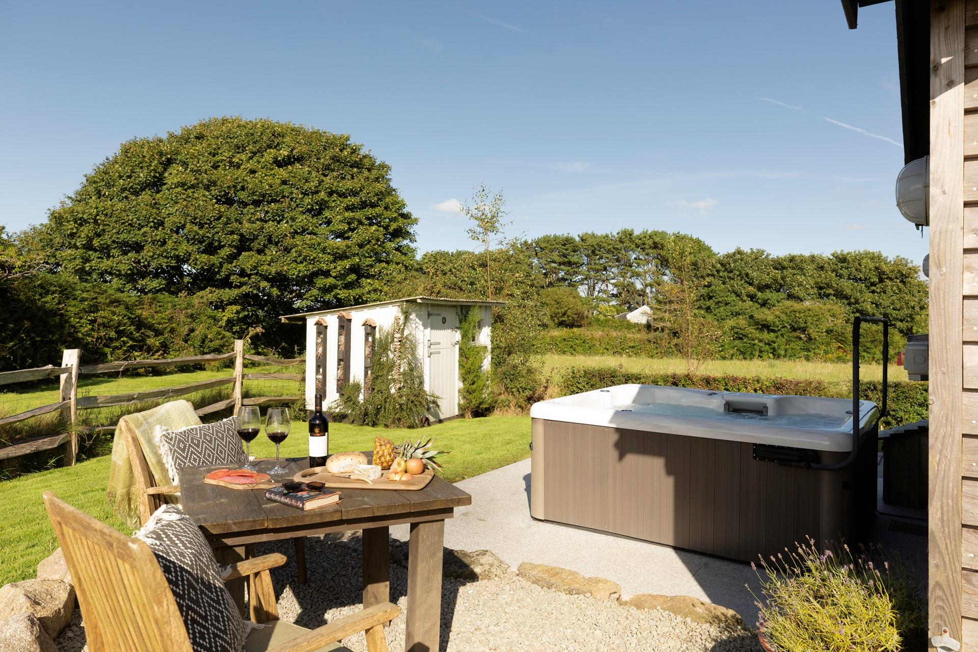 Sink into your bubbling hot tub any time of the day and forget the worries of the world.