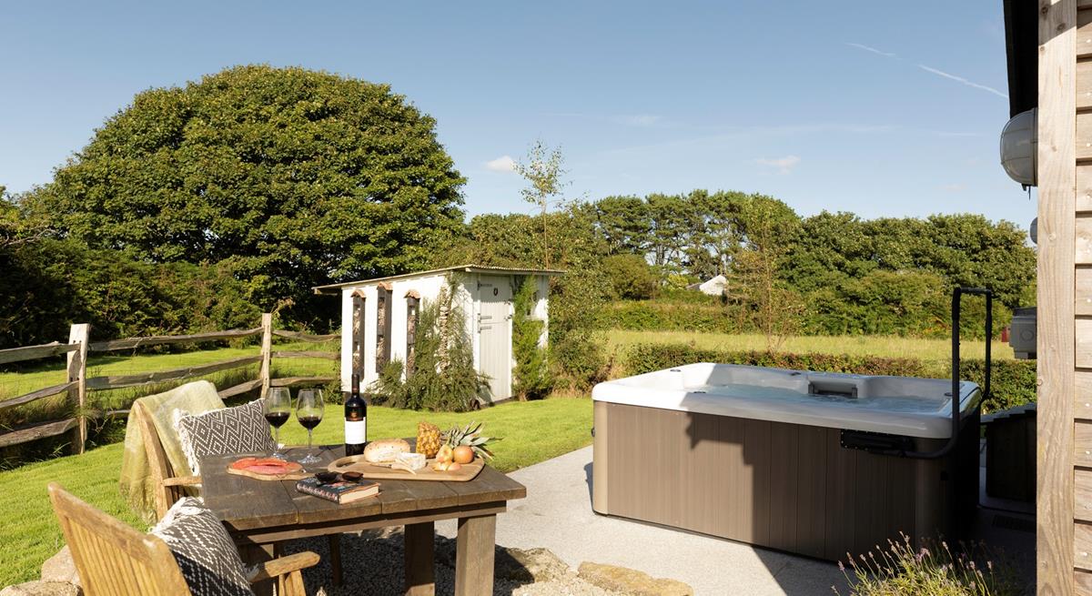 Sink into your bubbling hot tub any time of the day and forget the worries of the world.