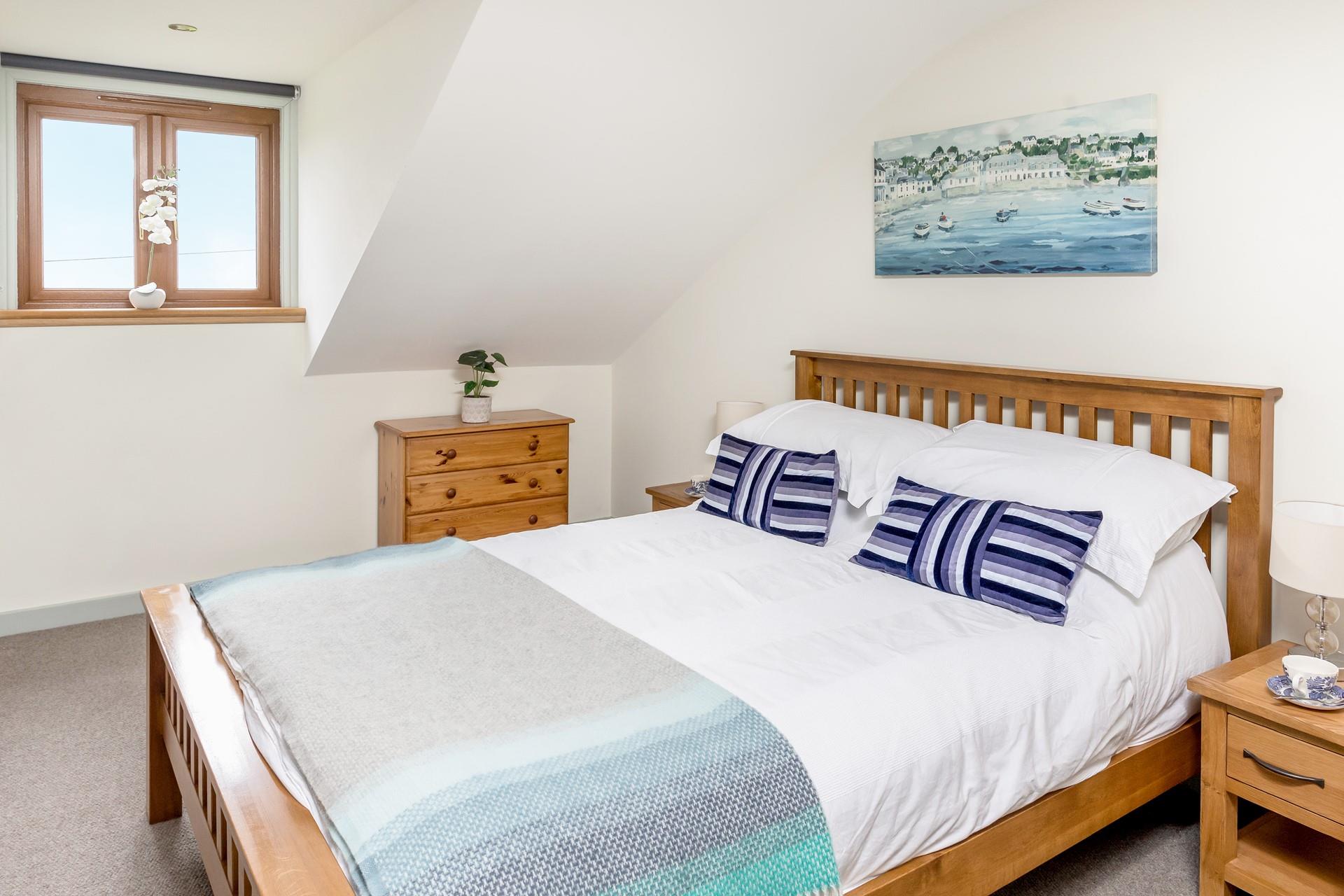 Tuck into the soft sheets of the king size bed and drift off for a dreamy night's sleep.