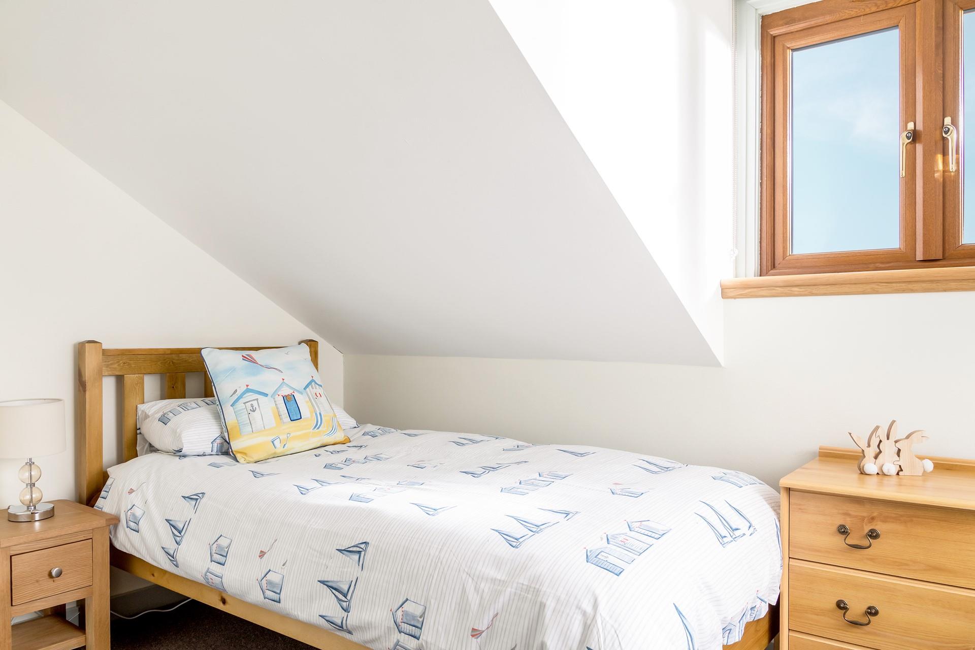 Bedroom 3 is perfect for the little ones to drift off after a busy day exploring.