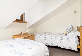 Bedroom 3 has seaside theme linen and is perfect for a relaxing night's sleep.