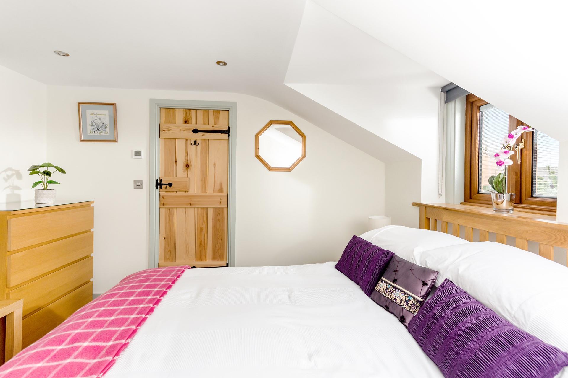 Relax into the soft sheets in the spacious king size bed and enjoy a peaceful night's slumber.