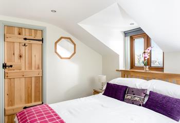 Bedroom 2 is bright and colourful and the king size bed provides a dreamy night's sleep.