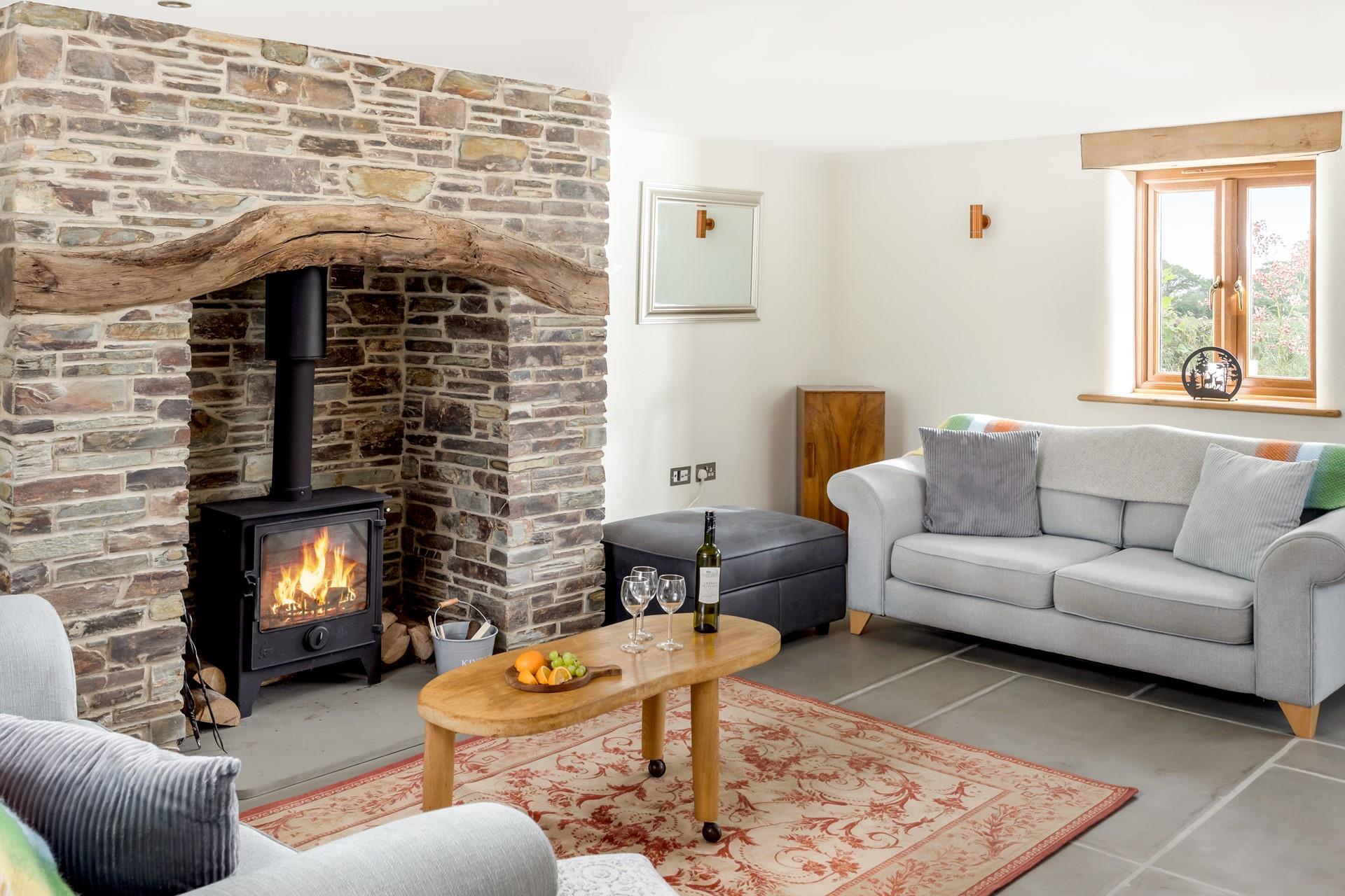 Cosy up in front of the flicker and crackle of the woodburner on a chilly evening.
